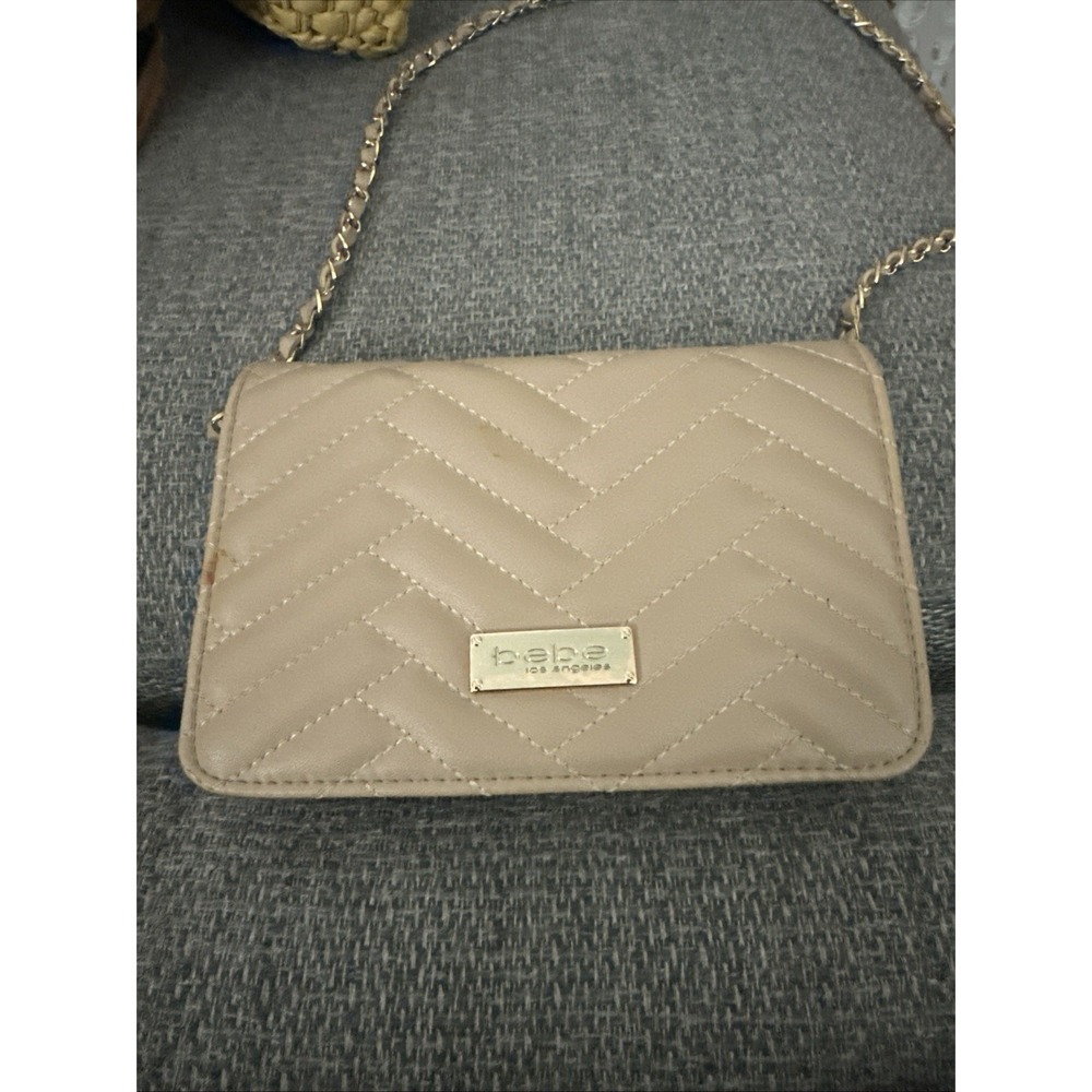 A Vintage bebe purse With Chain Strap